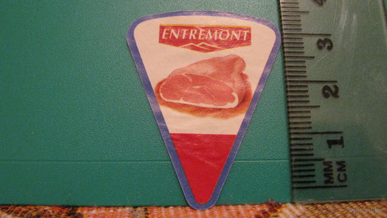 Этикетка от сыра Entremont.