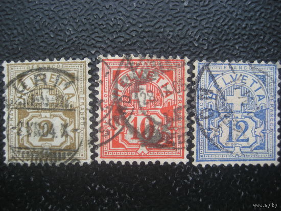 Швейцария 1882 год (бумага с цветными нитями) 3 марки (на марке номиналом 12 есть "утоньшения" бумаги)