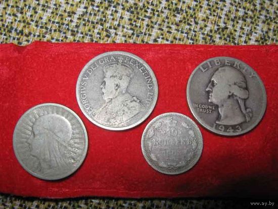 Монеты разные, серебряные 4 штуки.