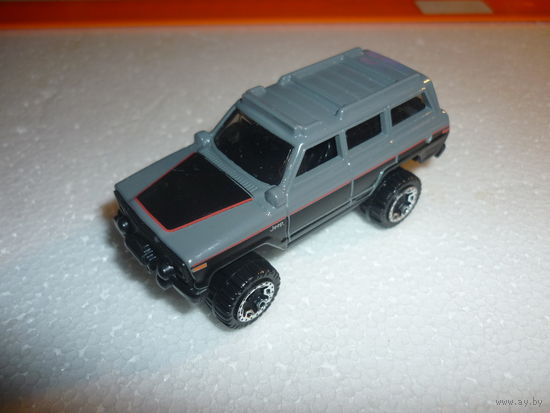 Модель машинки Jeep Wagoneer. Mattel-HotWheels.масштаб 1:62.