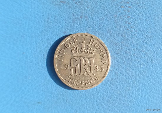 Великобритания 6 пенсов 1945 год серебро Георг VI
