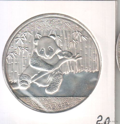 Копия инвестиционной монеты Китая 10 юаней 2014 года  1оз 999 , большая красивая монета,НО КОПИЯ!!!