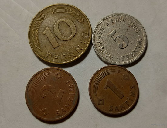 Монеты Германии и Латвии.