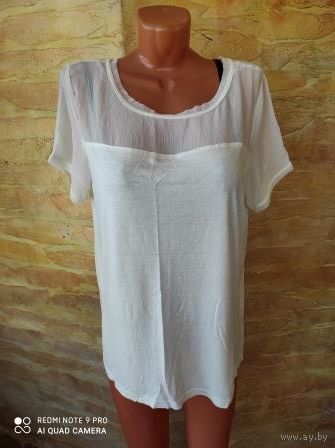 Красивая блуза на 56-58 размер, новая, интересная модель, легкая ткань. Приятный молочный цвет. Длина 71 см, ПОгруди 56-62 см (тянется). Очень классная блуза.