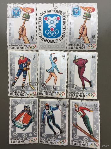 Бурунди 1968 год. X Зимние Олимпийские игры в Гренобле (серия из 6 марок + сцепка из 2 марок с купоном)